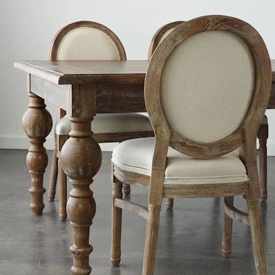 The Maison dining table from Nuage Designs is a classic option that speaks to the earthy feel of the hue.