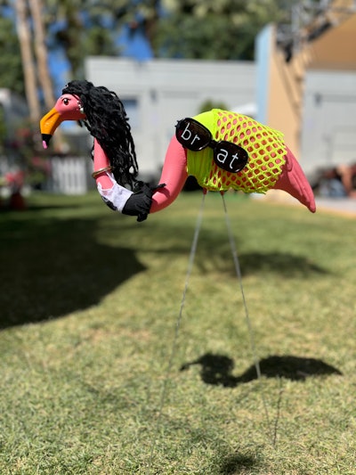 Decor details included a flock of 'flamingo-fied' versions of Coachella headlining artists by @palmeriart, plus a a custom tufted rug wall mural by YouTuber @SIMJI. The Palm Springs-inspired design was a collaboration between Good Sense & Co., Maxerie, BogartAndMoore, and a variety of local artists.